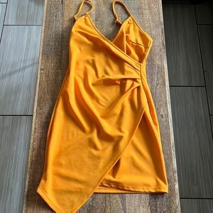 Orange asymmetrical mini dress